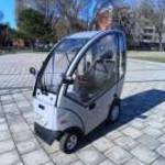Elektromos kabinos rokkantkocsi moped fotó