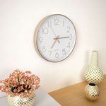rózsaarany színű falióra 30 cm fotó