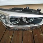 HELLA 1EX 011 930-02/AC jobb első Fényszóró , BMW 1-es sorozat . fotó