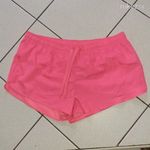 Crivit 46/48/XL-es neon pink színű, vékonyabb anyagú, gumis derekú sportos női short fotó