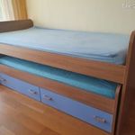 Kihúzható ágy ágyneműtartóval fotó
