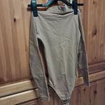 A2586. Gyerek felső, body 134/140 drapp, patentos, rugalmas fotó