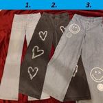 158 164 12 13 14 év H&M farmer hatású bőszárú trapéz farmer nadrág smiley world flared leg VÁSÁR fotó