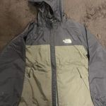 Fekete zöld színű North Face széldzseki, dzseki. Gyerek L. (Vi) fotó