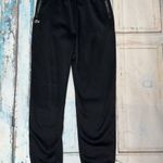 Fekete színű Lacoste melegítő nadrág. 158-164. 14 év. (Vi) fotó