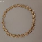 Női arany karlánc fotó