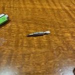 Iparos, vízmértékes, vonalzós, csavarhúzós toll fotó