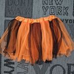 Gyönyörű hibátlan elegáns narancs színes szoknya kislánynak 134 - 140 cm 8 - 10 év - es méretben fotó